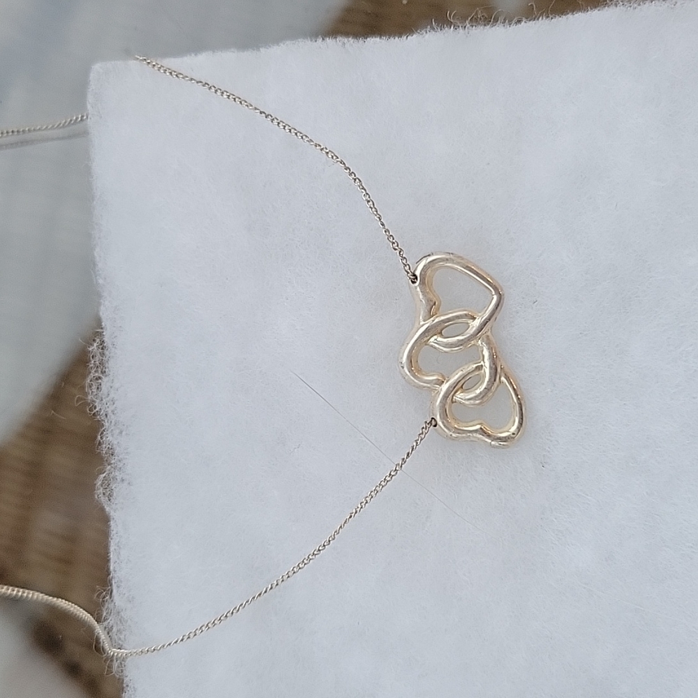 Tiffany & Co three hearts sterling silver necklace 15"